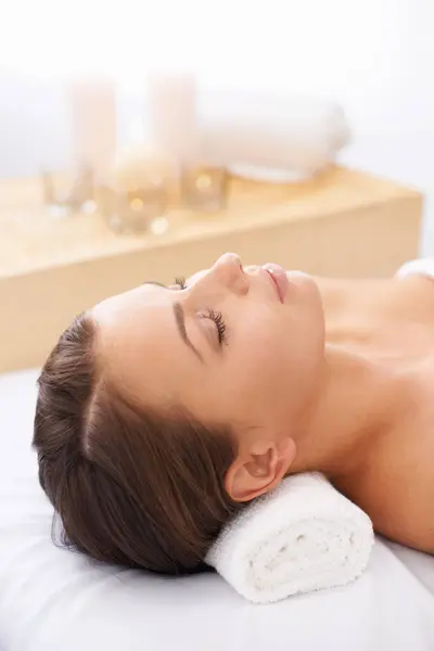 Woman, spa and relax for wellness and face, self care with aromatherapy or alternative medicine for peace and calm. Massage, luxury and zen with holistic healing and bodycare for stress relief.