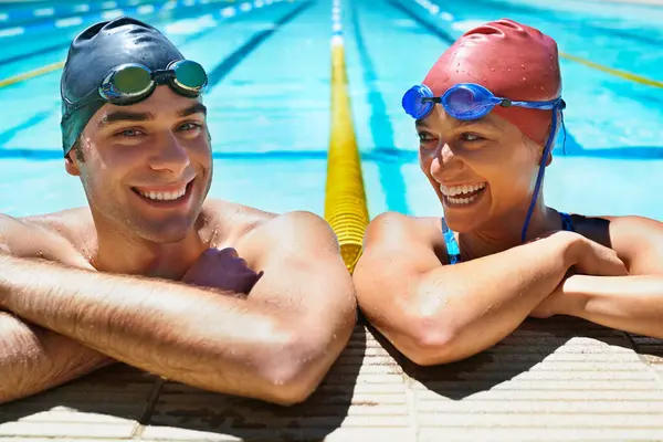 Swimming pool, portrait and happy friends relax after sports exercise, workout routine or training in water. Wet swimmer, joke and funny partner laughing after race, teamwork or challenge performance.