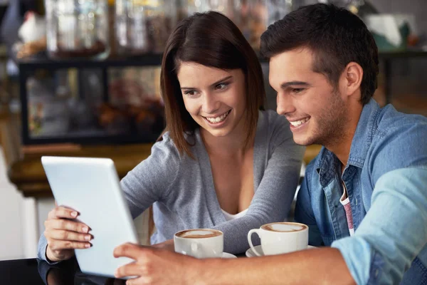 Tablet, coffee shop and couple of people reading online restaurant report, service insight or research of hospitality industry. Remote work, cafeteria teamwork or partner cooperation on project study.