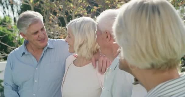 Mature Friends Hug Group Happiness Garden Smile Reunion Cheerful Bonding — Stock Video