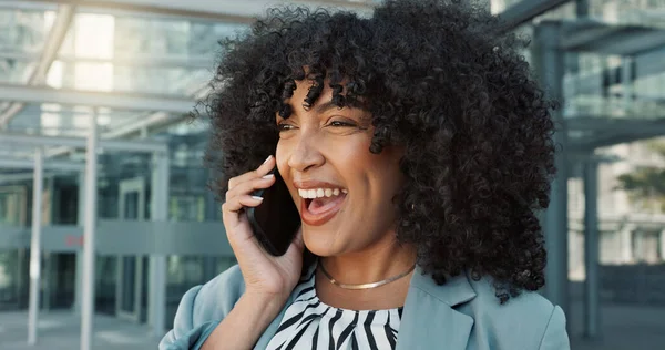 Happy black woman, phone call and laughing for funny joke, business conversation or communication in city. Face of African female person, afro and smile talking on mobile smartphone in fun discussion.
