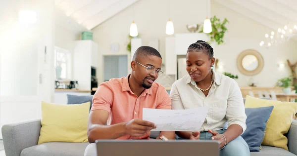Finance, budget and couple with laptop on sofa with bills, paperwork and life insurance documents. Financial planning, mortgage and black man and woman on computer for pension, payment or investment.