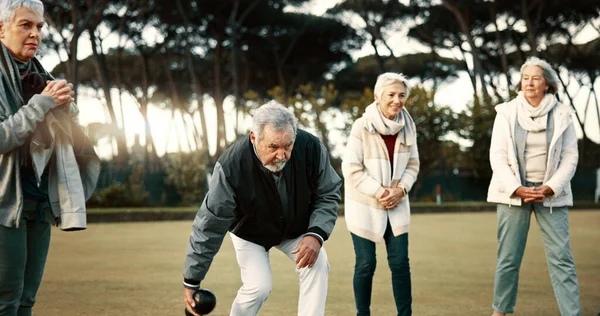 Bowls, applause and celebration with senior friends outdoor, cheering together during a game. Motivation, support or community and a group of elderly people cheering while having fun with a hobby.