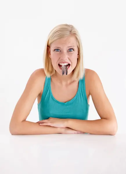 Woman Portrait Eating Fish Tail Strange Food Mouth White Background — Stock Photo, Image