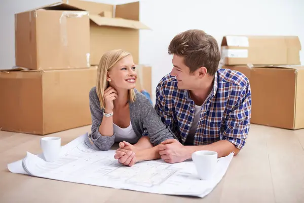 Man Woman Happy Floor Plan Blueprints Home Renovation Moving Boxes — Stock Photo, Image