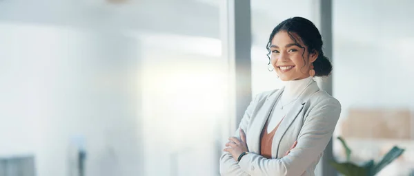 Happy, face and woman with arms crossed in office with business pride and corporate work. Smile, company and portrait of a female employee with confidence and professional empowerment at an agency.