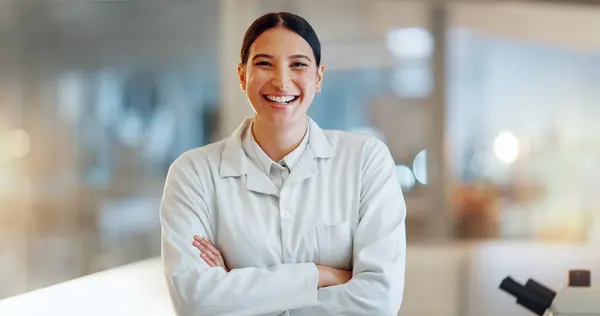 Lab woman, arms crossed and scientist happy for clinic confidence, medical innovation or pharma study, trust or investigation. Expert portrait, laboratory study and person work on science development.