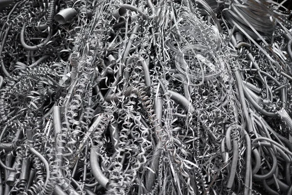 Metal shaving, wire and abstract of material with scrap, manufacturing and industry maintenance. Design, aluminium and waste with texture for production, construction and recycling for environment.
