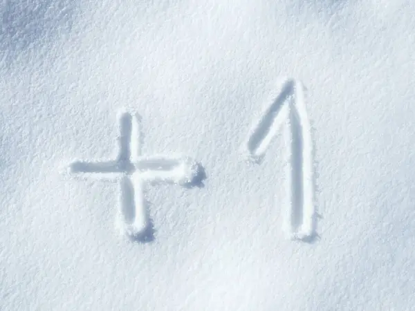 Snow, writing and numbers with addition, plus and font on ice and symbols outdoor in winter. Text, mathematics and practice with arithmetic for knowledge and education with cold weather and equation.