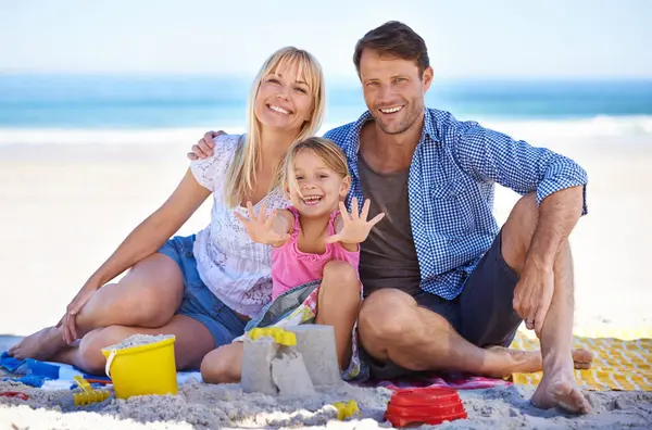 Parents Girl Sandcastle Portrait Beach Blanket Excited Hug Holiday Summer — Stock Photo, Image