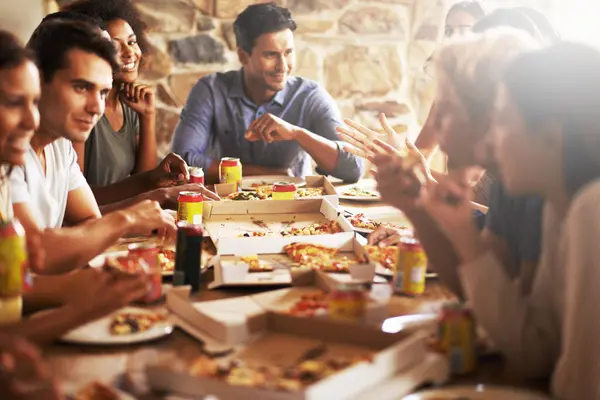 Group, friends and party with pizza, discussion and diversity for joy or fun with youth. Men, Women and fast food with drink, social gathering and snack for lunch or eating at italian pizzeria.