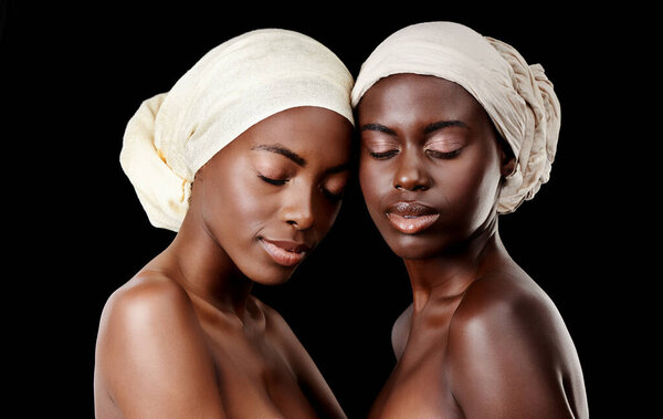Beauty, scarf and African women in studio for wellness, health and hair care treatment. Salon aesthetic, culture and face of black people with accessories, cosmetics and makeup on dark background.
