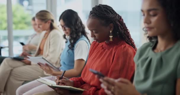 Black Woman Book Writing Row Hiring Job Career Opportunity Waiting — Stock Video