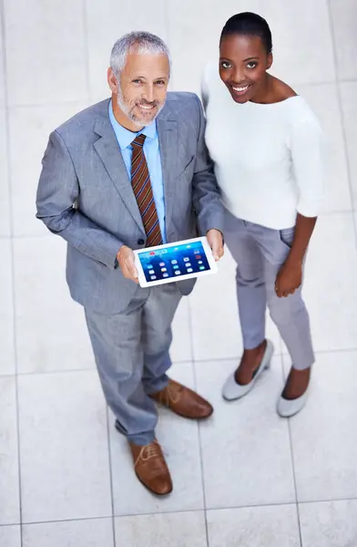 Businessman, black woman and portrait with tablet in office for internet, email and planning for business meeting. Manager, assistant and team with diversity from above view in corporate career.
