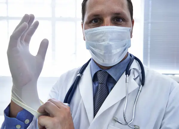 Portrait Doctor Man Put Gloves Mask Protection Safety Hospital Face — Stock Photo, Image