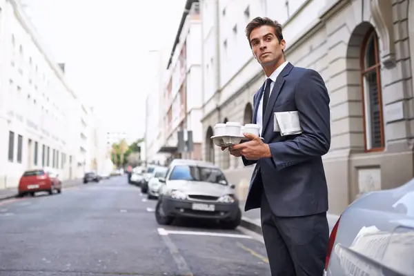 Businessman, coffee and street for travel to office, building or meeting in London. Road, cars and intern with thinking for journey, commute or trip to workplace for drink delivery in morning.