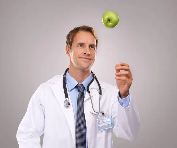 Man Doctor Apple Healthcare Studio Medical Expert Dietician Gray Background — Stock Photo, Image