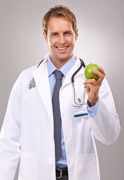 Man Doctor Apple Studio Portrait Medical Expert Dietician Gray Background — Stock Photo, Image