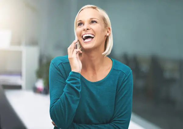 Business woman, phone call and happy at startup with thinking, laughing and contact in modern office. Entrepreneur, smartphone and excited with smile for networking, conversation or deal at agency.