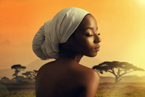 Beauty, culture and natural black woman in Africa at sunset with turban for cosmetics or wellness. Skincare, heritage and tradition with confident young model outdoor in nature for dermatology.