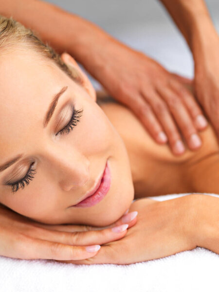 Relax, hands and woman with back massage at spa for wellness, health and self care. Calm, zen and happy female person sleeping with masseuse for body skin treatment or therapy at beauty salon