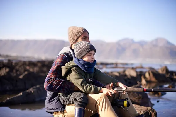 Father Fishing Young Boy Rocks Teaching Bonding Activity Ocean Sea — Stock Photo, Image