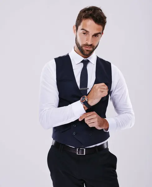 Studio, portrait and gentleman in suit for fashion, stylish and luxury for aesthetic of glamour and classic. Adult, guy and male person in white background, tuxedo and professional for job and career.