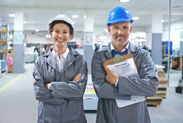 Portrait, people or paper in hard hat, logistics or product delivery in warehouse building. Mature man, happy woman or clipboard in document, stock or shipping administration as supply chain project.