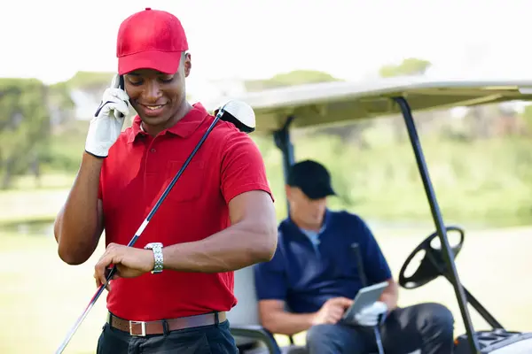 Man, phone call and check time on golf course, communication and planning for schedule. Black male person, talking and athlete for networking outdoors, golfer and watch for appointment on b2b chat.