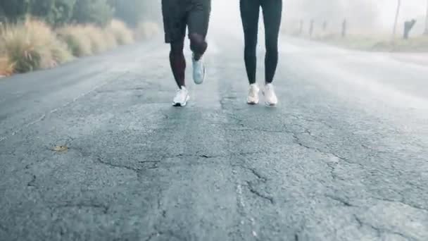 Closeup Running Couple Fitness Exercise Rain Wellness Training Nature Legs — Stock Video