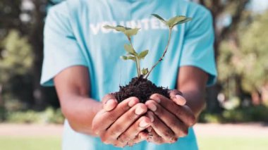 Toplumda bahçeyi büyütmek için gönüllü ve destekleyici bitki, bakım ve insan elleri. Sürdürülebilir, bahçıvanlık ve toprak yaprakları tarıma yardım etmek için toprak günü.