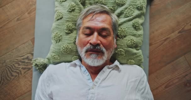 Senior Man Lying Relax Pillow Zen Health Wellness Wooden Floor — Stock Video
