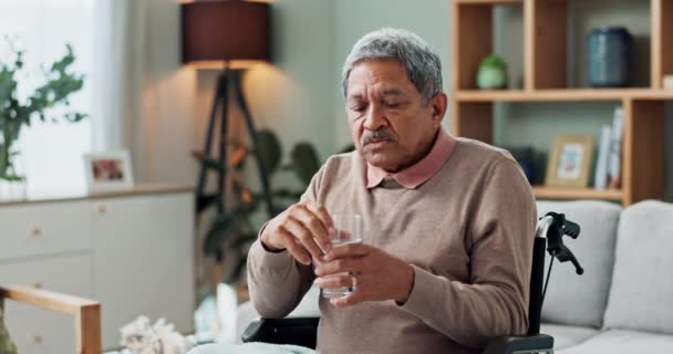 Senior Man Rullstol Och Dricksvatten Hemmet Med Depression Sjukdom Eller — Stockvideo