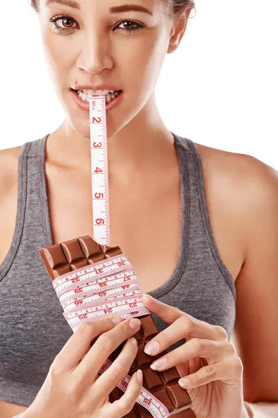 Woman Chocolate Bite Measuring Tape Unhealthy Diet Junk Food Studio — Stock Photo, Image