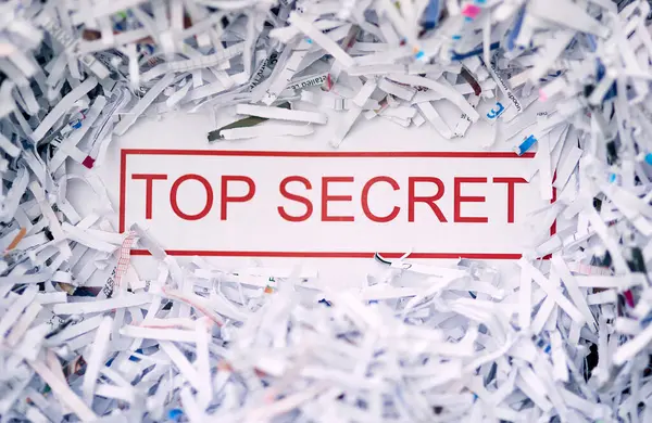 Shred, top secret or words on paper, document or confidential report to clear page or evidence in waste. Destruction, information or classified in policy, tear or privacy with cut on white background.
