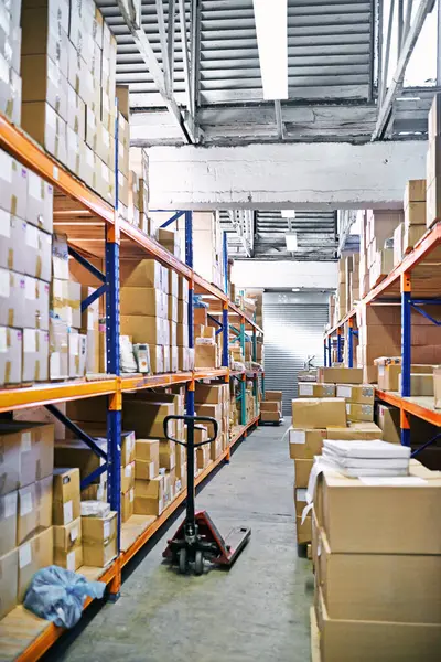 Stock, product and box in factory for ecommerce, delivery and logistics for retail and shipping. Supply chain, warehouse or industry with boxes and manufacturing for store, service and storage.