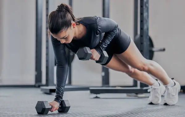 Woman Push Dumbbell Gym Workout Exercise Training Strong Abs Muscle royaltyfrie gratis stockbilder