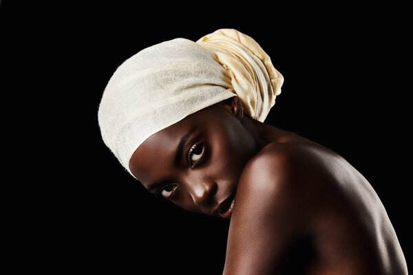 Art, studio and black woman with head scarf, natural makeup or creative aesthetic in mockup space. Beauty, skincare and African girl on dark background with wrap, facial cosmetics and confidence