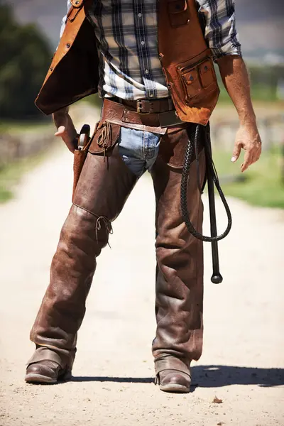 stock image Person, outdoors and gun ready to shoot for standoff or gunfight in duel for wild western culture in Texas. Cowboy gunslinger or outlaw, revolver and confrontation for defense or conflict with battle.