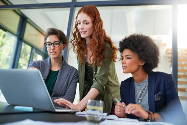 Laptop, teamwork or women in startup for problem solving, conversation or discussion for tech news. Solution, meeting or people in office for planning strategy, feedback data or online collaboration.