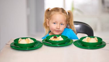 Girl, food and eating with donation, charity and community service by volunteer group at orphanage. Child, portrait and lunch by Christian ngo for helping kids, society project and world poverty. clipart