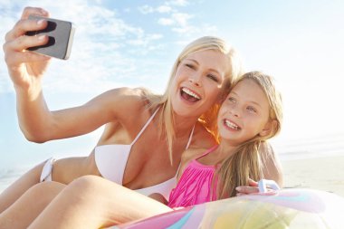 Mom, girl and selfie in beach for holiday in summer with bonding, support and care in Miami. Parent, kid and smile or excited with fun at seaside on vacation, trip and travel with cresting memories. clipart