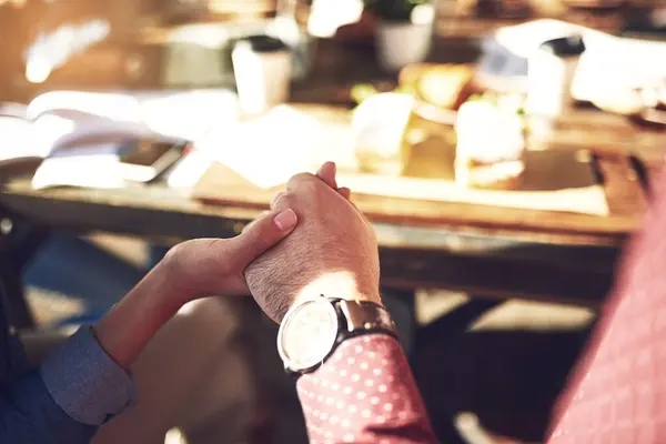 stock image People, restaurant and holding hands for prayer or grace to bless food and lunch. Friendship, unity and care with support or trust in date for brunch with thanks, appreciation and grateful for meal.