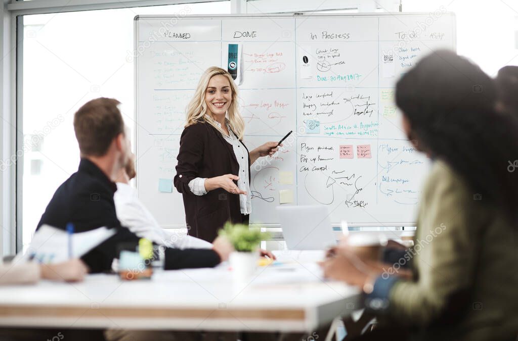 Presentation, planning and business woman on whiteboard for training or brainstorming creative ideas. Team, meeting or happy presenter on board for project discussion, strategy or web design workshop.