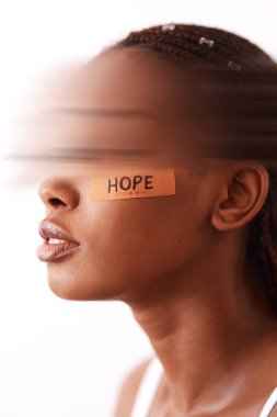 Woman, studio and plaster on face with blur eyes for emdr therapy, healing treatment or reduce trauma memories. Person, censor or hope bandage in psychotherapy for ptsd or anxiety on white background. clipart