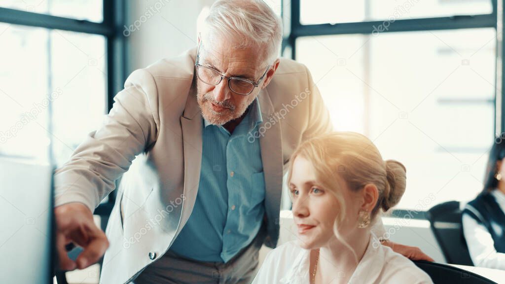 Business people, coach or pointing with computer at office for internship program or training staff. Businessman, mentor or helping junior intern with technology for new software, update or tasks.