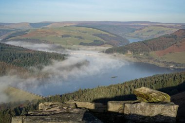 Bamford Edge. Ladybower, and Hope Valley winter sunrise temperature inversion in the Peak District National Park, England, UK.