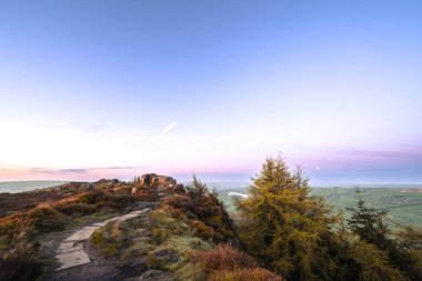 Blue hour sunrise at The Roaches in the Staffordshire Peak District National Park, England, UK. clipart