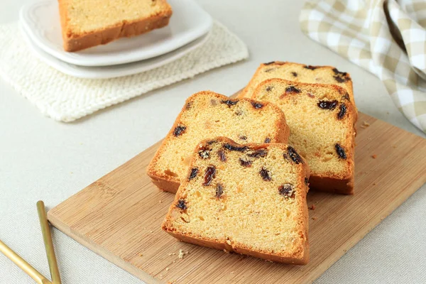 Homemade Freshly Baked Cake Loaf with Raisins. Traditional Treat for Tea or Coffee. Pound Cake. Delicious Breakfast.
