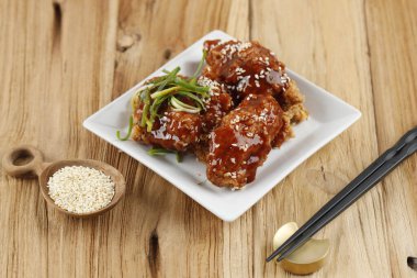 Yangnyeom Tongdak, Sweet and Spicy Korean Fried Chicken with Gochujang, Garlic, Sugar. 